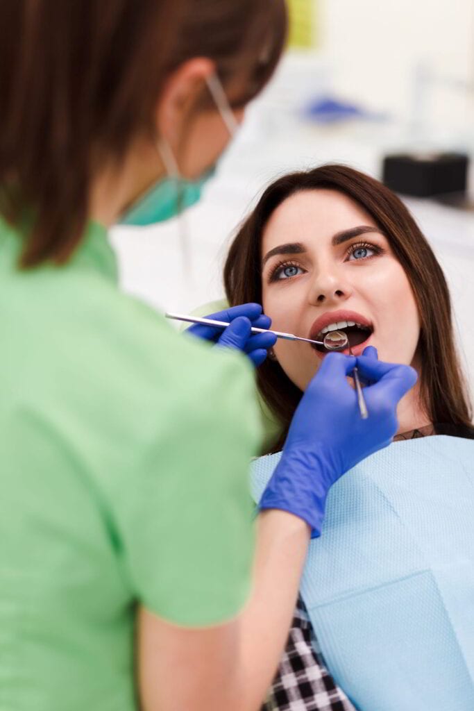 10 Facts on How Often You Should See a Dentist 2 dentist oral exam
